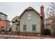 Charming two-story home boasts a classic design, complete with a well-maintained yard and inviting facade at 634 E Vermont St, Indianapolis, IN 46202