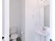 Small bathroom with single sink and toilet at 6752 W Buck Stone Dr, McCordsville, IN 46055