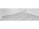 Empty bedroom with neutral carpet, white walls, and an open door at 6752 W Buck Stone Dr, McCordsville, IN 46055