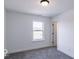 Spacious bedroom with gray carpet and a window at 6752 W Buck Stone Dr, McCordsville, IN 46055