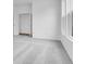 Bedroom featuring grey carpet, two windows, a closet and an open door way at 6752 W Buck Stone Dr, McCordsville, IN 46055