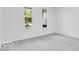 Bedroom with two large windows providing lots of natural light and grey carpet at 6752 W Buck Stone Dr, McCordsville, IN 46055