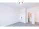 Simple bedroom with grey carpet and ensuite bath at 6752 W Buck Stone Dr, McCordsville, IN 46055