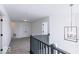 Upper hallway with gray carpet and modern light fixture at 6752 W Buck Stone Dr, McCordsville, IN 46055