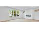 Bright, airy living room features a sleek fireplace, and three windows with great natural light at 6752 W Buck Stone Dr, McCordsville, IN 46055