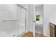Bright bathroom featuring a glass enclosed shower with white subway tile at 6752 W Buck Stone Dr, McCordsville, IN 46055