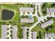 This townhome has lush surroundings, a pond, and convenient community parking at 7042 Tyler Ln, Indianapolis, IN 46217