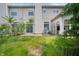 This townhome has a quaint backyard with a private fenced-in patio at 7042 Tyler Ln, Indianapolis, IN 46217