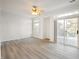 Bright dining room with sliding glass door leading to patio at 7042 Tyler Ln, Indianapolis, IN 46217
