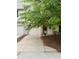 Attractive townhouse featuring an attached garage, well-maintained landscaping, and a welcoming entrance at 7042 Tyler Ln, Indianapolis, IN 46217