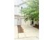 Attractive townhouse featuring an attached garage, well-maintained landscaping, and a welcoming entrance at 7042 Tyler Ln, Indianapolis, IN 46217