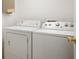 Laundry room with washer and dryer included at 7042 Tyler Ln, Indianapolis, IN 46217