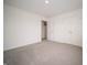 Bright bedroom offering closet space, neutral walls, and plush carpeting, ready for personalization at 7824 Magnolia St, New Palestine, IN 46163
