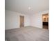 A spacious bedroom provides two doorways leading to a bathroom, and hallway providing plenty of living space at 7824 Magnolia St, New Palestine, IN 46163