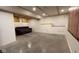 Spacious finished basement with concrete floors and built-in storage at 7887 Elk Dr, Nineveh, IN 46164