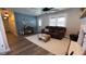 Cozy living room with fireplace and brown couch at 7887 Elk Dr, Nineveh, IN 46164