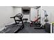 Basement gym with treadmill, weights, and bench at 7928 Stonebriar Way, Indianapolis, IN 46259