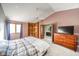 Main bedroom with vaulted ceilings, large closet, and en-suite bathroom at 8022 Talliho Dr, Indianapolis, IN 46256