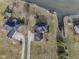 Bird's eye view of a home with a large yard and lake access at 8152 Cottonwood Dr, Martinsville, IN 46151