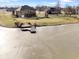 House with a backyard deck overlooking a frozen pond at 8152 Cottonwood Dr, Martinsville, IN 46151