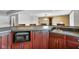 Basement wet bar with microwave and ample cabinet space at 8152 Cottonwood Dr, Martinsville, IN 46151