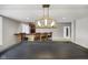 Basement bar with seating, game table, and wine storage at 8152 Cottonwood Dr, Martinsville, IN 46151
