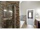 Bathroom with shower, garden tub, and double sinks at 8152 Cottonwood Dr, Martinsville, IN 46151