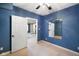 Basement bedroom with mirrored wall and access to another room at 8152 Cottonwood Dr, Martinsville, IN 46151