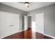 Spacious bedroom with hardwood floors and double doors at 8152 Cottonwood Dr, Martinsville, IN 46151