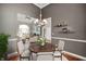 Elegant dining room with hardwood floors and chandelier at 8152 Cottonwood Dr, Martinsville, IN 46151