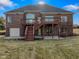 Back of house with two-tiered deck and attached garage at 8152 Cottonwood Dr, Martinsville, IN 46151