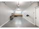 Finished garage with workbench and storage at 8152 Cottonwood Dr, Martinsville, IN 46151