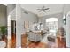 Living room with hardwood floors, vaulted ceiling and access to deck at 8152 Cottonwood Dr, Martinsville, IN 46151