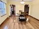 Inviting dining room with hardwood floors and a table set for two at 8660 S Peoga Rd, Trafalgar, IN 46181