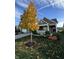 Attractive ranch home with autumn landscaping and pumpkins at 8737 Twain Ln, Indianapolis, IN 46239