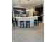 Modern kitchen with large island and dark cabinets at 8737 Twain Ln, Indianapolis, IN 46239