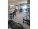 Open concept living area with kitchen and dining views at 8737 Twain Ln, Indianapolis, IN 46239