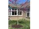 Beautiful redbud tree in full bloom near sunroom at 8737 Twain Ln, Indianapolis, IN 46239