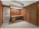Finished basement with wood paneling and storage at 1023 Franklin St, Columbus, IN 47201