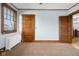 Spacious bedroom with hardwood floors and built-in storage at 1023 Franklin St, Columbus, IN 47201
