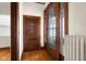 Entryway with hardwood floors and stained glass door at 1023 Franklin St, Columbus, IN 47201