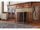 Fireplace with tiled hearth and built-in shelving at 1023 Franklin St, Columbus, IN 47201