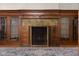 Detailed fireplace with tiled hearth and ornate mantel at 1023 Franklin St, Columbus, IN 47201