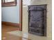 Ornate antique fireplace with yellow tile surround at 1023 Franklin St, Columbus, IN 47201