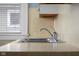 Modern kitchen sink with chrome faucet at 1023 Franklin St, Columbus, IN 47201