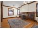 Spacious living room with hardwood floors and fireplace at 1023 Franklin St, Columbus, IN 47201