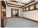 Open living area with pocket doors and hardwood floors at 1023 Franklin St, Columbus, IN 47201