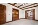 Living room with pocket doors and built-in shelving at 1023 Franklin St, Columbus, IN 47201