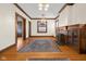 Living room featuring hardwood floors, fireplace, and built-ins at 1023 Franklin St, Columbus, IN 47201