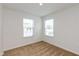 Simple bedroom with neutral walls and carpet at 12179 Country Side Dr, Cumberland, IN 46229